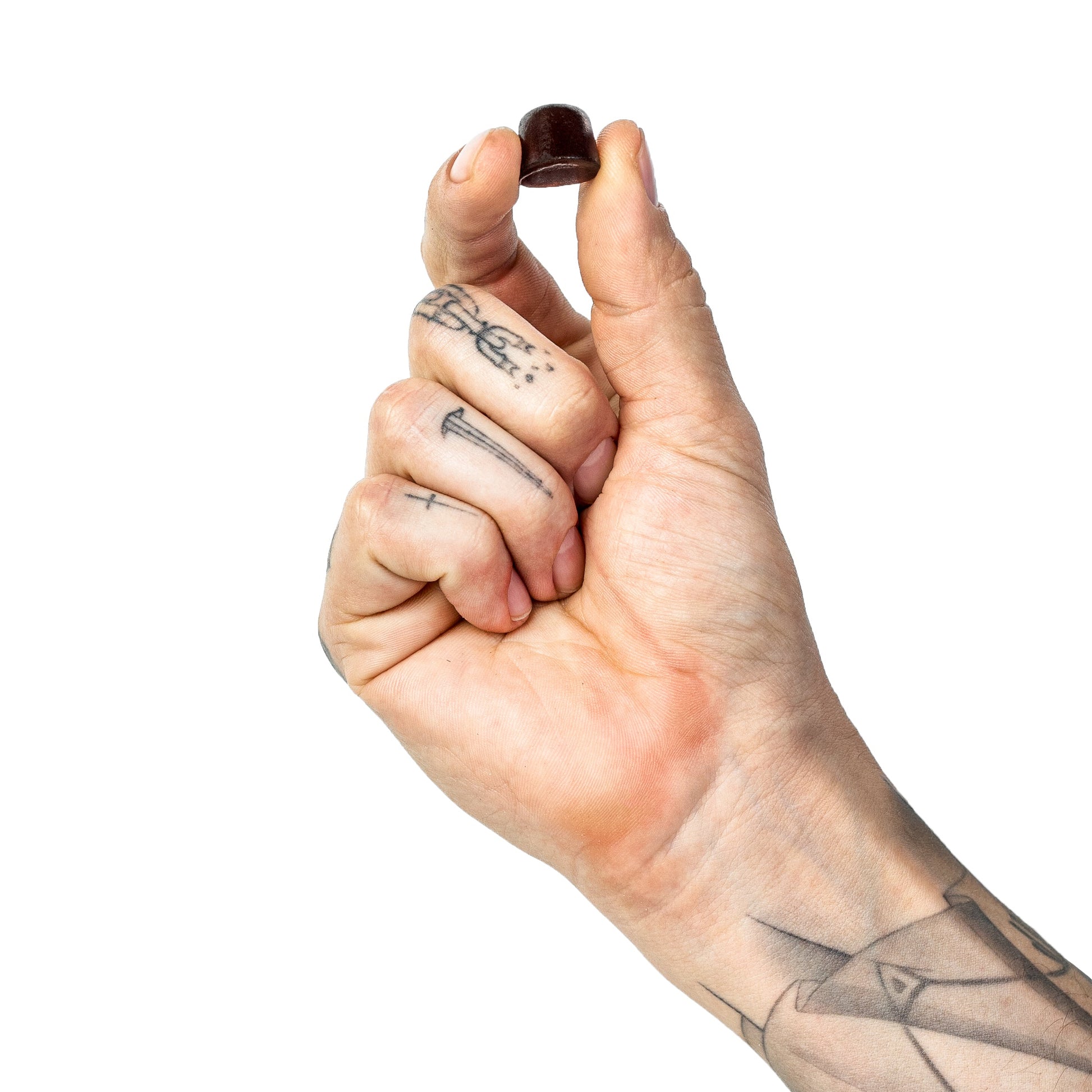 Hand holding a Salty Peaks electrolyte gummy