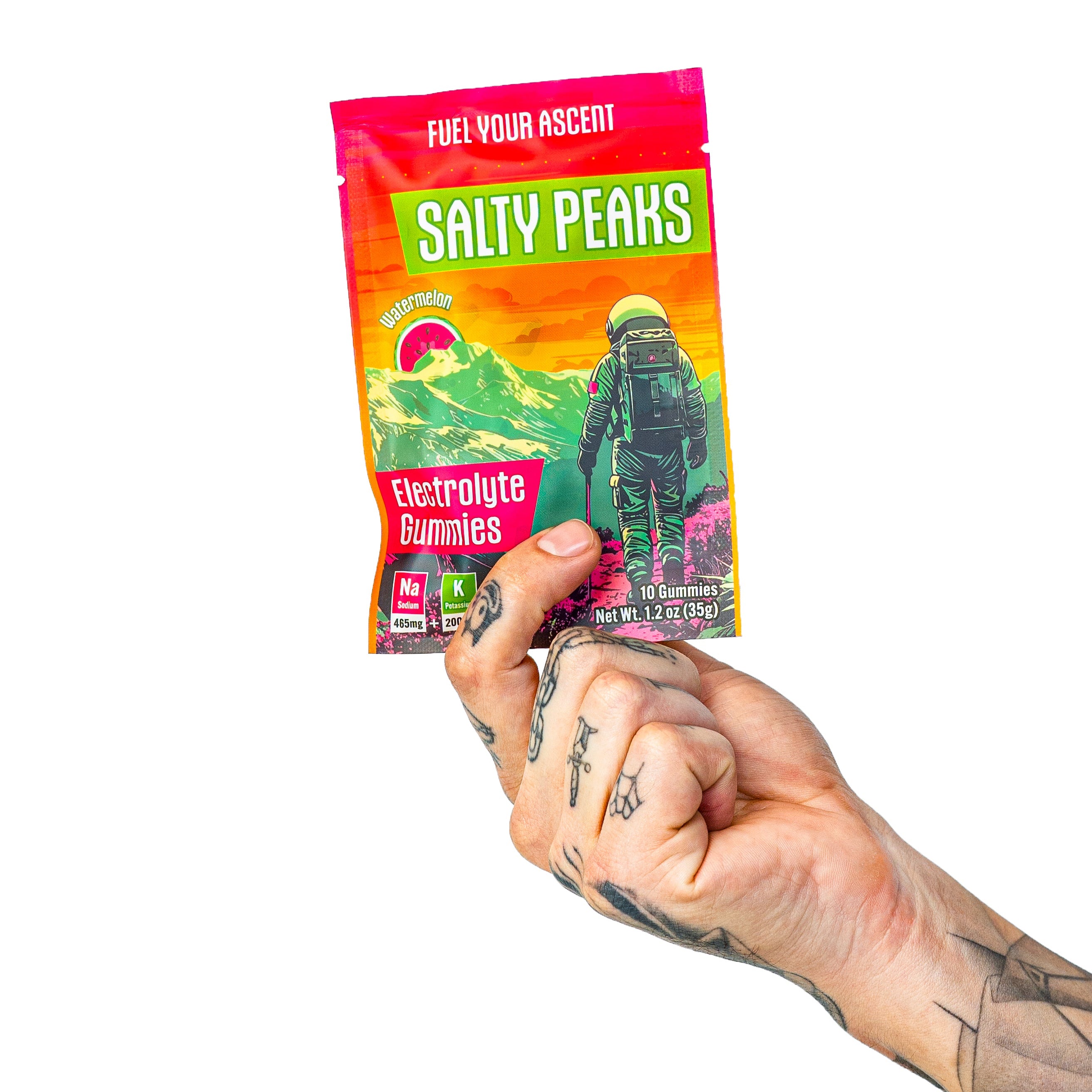 Hand holding Salty Peaks single-serve electrolyte gummies packet