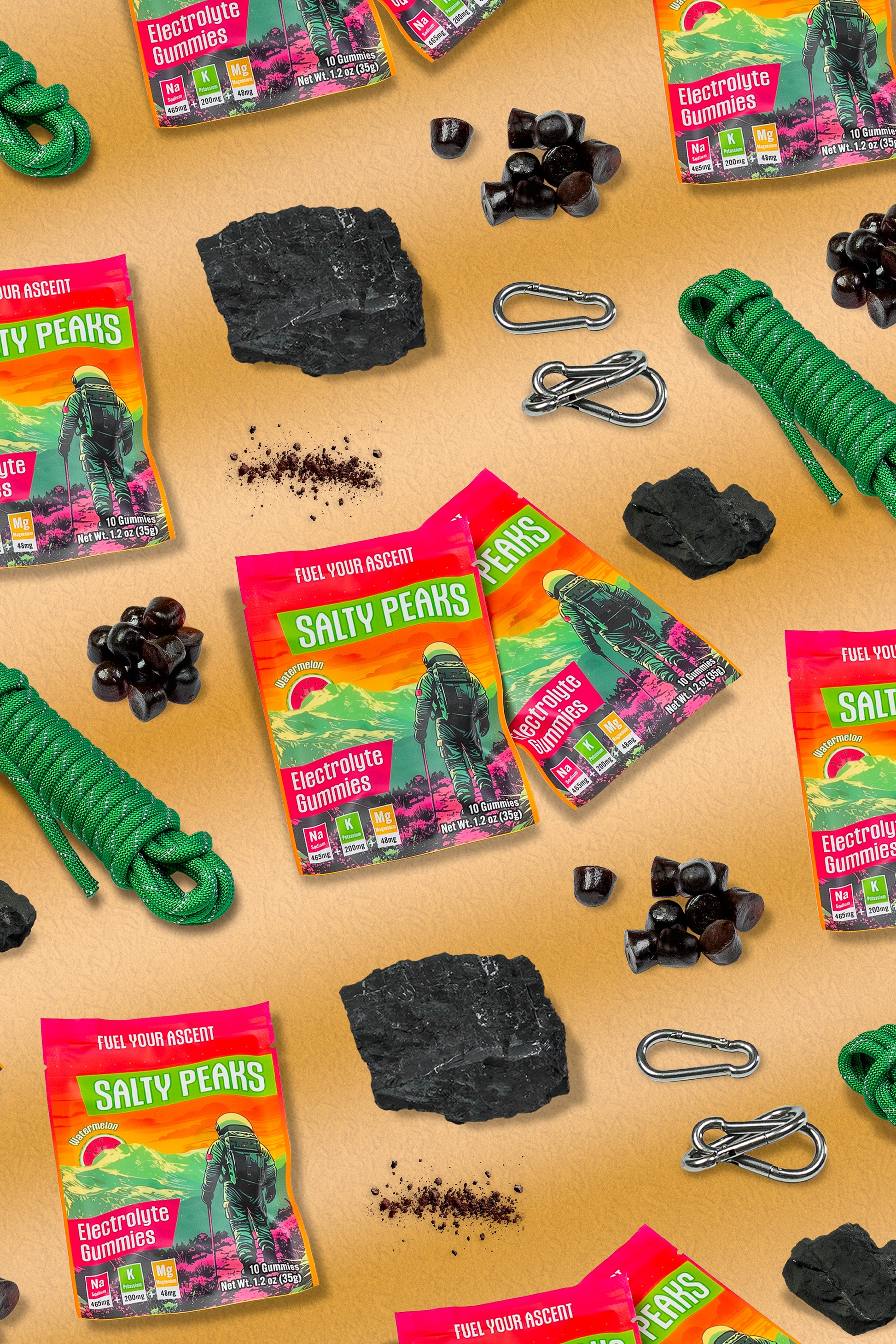 Salty Peaks electrolyte gummies flat lay with climbing gear